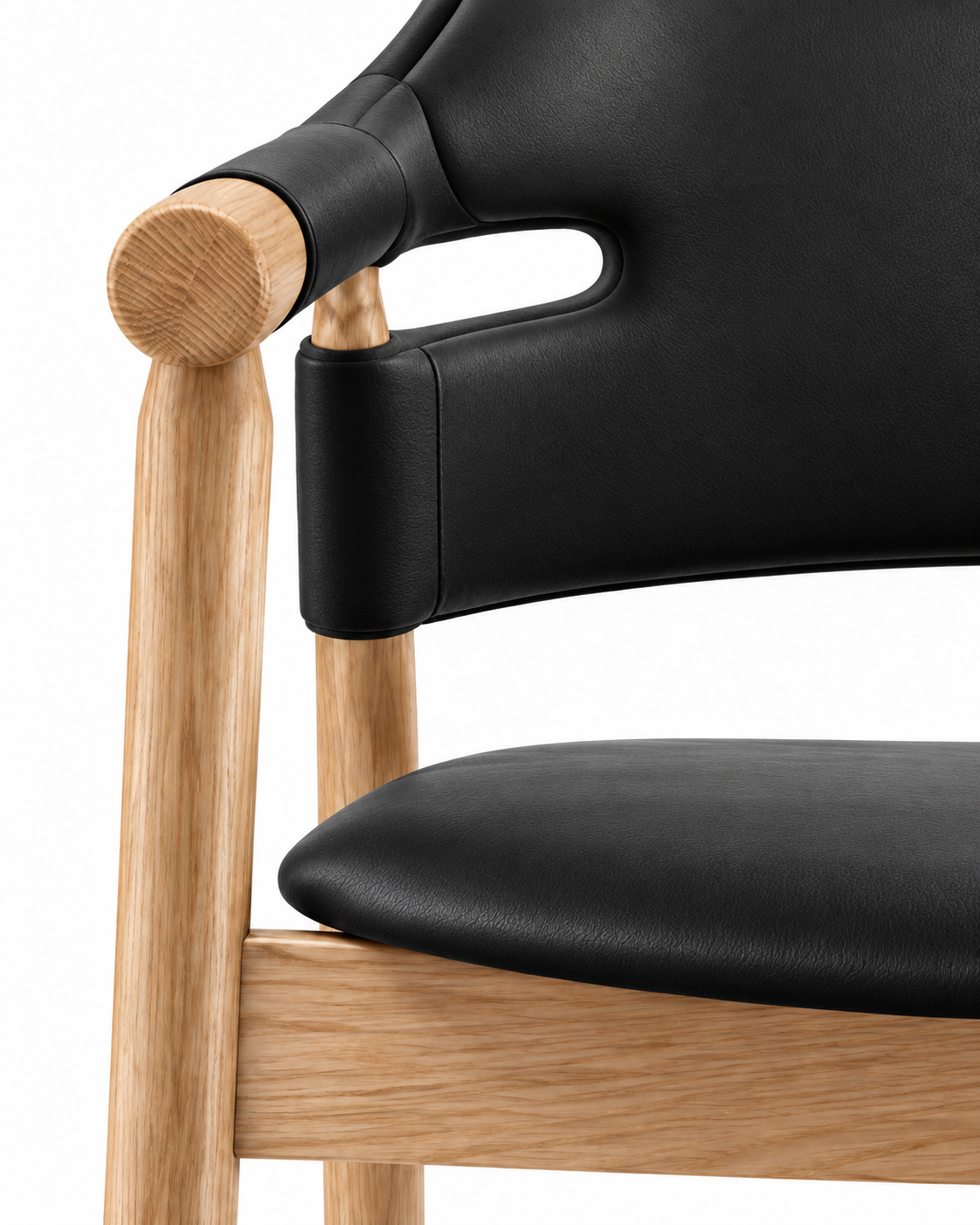 FRAME DINING CHAIR WITH ARMRESTS material close-up — black leather